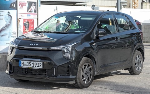 Kia Picanto gris oscuro de tres cuartos delantero