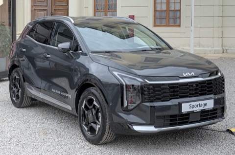 Kia Sportage gris de tres cuartos delantero